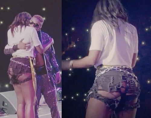 Fans React as Tiwa Savage Flashes Butt in Ripped Bum Shorts at Wizkid’s Concert [Photos]