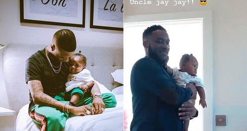 Ex-Footballer JJ Okocha spotted with Wizkid and his son, Zion in London [Video]