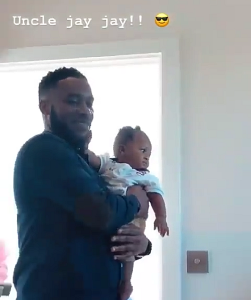 Ex-Footballer JJ Okocha spotted with Wizkid and his son, Zion in London [Video]