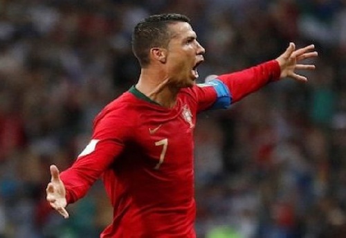 BREAKING: Cristiano Ronaldo Breaks, Set New World Cup Records With 3 Goals Against Spain Not Even Messi Can Match This One 06/15/2018 Admin Sports 0 breaking cristiano ronaldo breaks set 97 Shares 94 BREAKING Cristiano Ronaldo Breaks Set New World Cup Records With 3 Goals Against Spain Not Even Messi Can Match This One Real Madrid star Cristiano Ronaldo on Friday night, June 15, scored three goals as Portugal played 3-3 draw with Spain The match was their Group B opener at the FIFA 2018 World Cup going on in Russia – Atletico Madrid striker Diego Costa also scored two goals for Spain in this encounter Real Madrid star Cristiano Ronaldo proved on Friday night, June 15, that he is the world best footballer when he scored three goals as Portugal forced Spain to a 3-3 draw in Group B opener at the Russia 2018 World Cup . Portugal started the match impressively as it took them only four minute to score their first goal through Cristiano Ronaldo via a penalty. He was brought down by Nacho Fernandez and the referee had no choice than to give a penalty which was superbly scored by Ronaldo. But Diego Costa restored parity for Spain in the 24th minute when he dribbled Pepe and Cedric to score a fantastic goal. Ronaldo scored again in the 44th minute after a superb pass from Goncalo Guedes as the first half ended with Portugal leading 2-1. Spain came out in the second half aggressive scoring two goals in the space of three minutes through Diego Costa and Nacho Fernandez . The Spanish fans thought their players would win the match, but Cristiano Ronaldo broke their hearts as he scored at the death for the match to end 3-3. breaking cristiano ronaldo breaks set Below is the live updates of the match. Full Time’ And that is it as the referee blows the final whistle for this match between Portugal and Spain which ended 3-3. What a match. 90′ Raphael Guerreiro from Portugal tries to pick out a team-mate in the area but his cross is blocked by an opponent 88′ Goal……….Cristiano Ronaldo curls the direct free kick into the back of the net! Wonderful finish 86′ David Silva is now leaving the field for Spain. He tried all he could to get register his name on the sheet, but he could not 85′ That’s a great ball by Iago Aspas from Spain as he directs the ball behind the defense, but the chance eventually goes begging 83′ Spain international Iago Aspas tries his luck from distance but his effort ends up safely in the hands of Portugal goalie Rui Patricio 80′ We are now in the last 10 minutes of this game between Portugal and Spain and the Spaniards are still leading 3-2 72′ Cristiano Ronaldo’s wing seems to have been clipped in this second half as Spain defenders are not giving him any space to run 71′ Jose Fonte from Portugal tries to head the ball to a team mate, but it’s intercepted by Jordi Alba 69′ Ricardo Quaresma from Portugal tries to pick out a team-mate in the area but his cross is blocked by Sergio Ramos who has been wonderful for Spain in the defense 65′ William Carvalho from Portugal crosses the ball, but it goes out for a throw-in. Busquets takes the throw and finds Isco who was blocked by Cedric 63′ Bernardo Silva is very lucky not to be booked for a cynical pull on Isco. The referee played a good advantage but should have gone back to book Silva. Isco has been so brilliant tonight for Spain. FIFA World Cup @WorIdCupUpdates WHAT A GOAL!!! 3-2 SPAIN!! AMAZING STRIKE BY NACHO!! 8:17 PM - Jun 15, 2018 4,096 2,912 people are talking about this Twitter Ads info and privacy BREAKING Cristiano Ronaldo Breaks Set New World Cup Records With 3 Goals Against Spain Not Even Messi Can Match This One