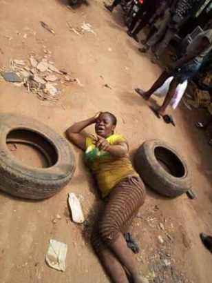 Heartbroken Lady Gets Drunk after Her Shop Was Demolished By Anambra State Government