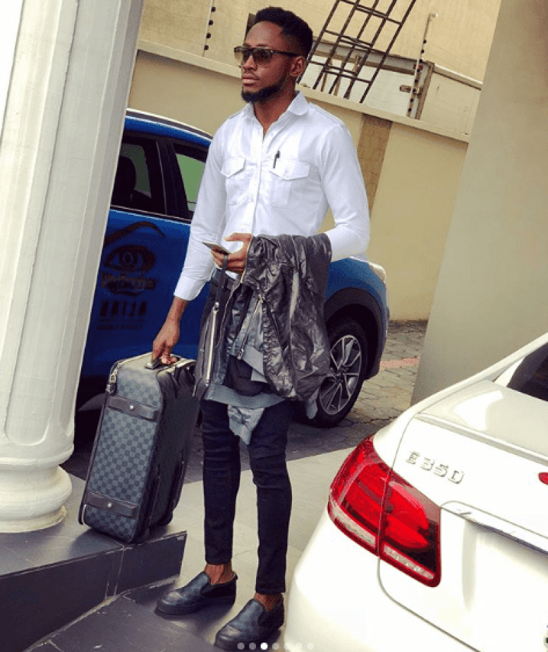 #BBNaija: FLY BOY, Miracle Looks Dapper In New Photos, As He Shows Off His SUV Car