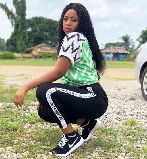 Nollywod Teenage Actress, Regina Daniels Dazzles In Super Eagles Jersey [Photos]