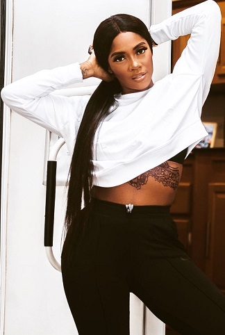 Tiwa Savage Shows Off Her Belly 'Henna' Tatt [Photos] 