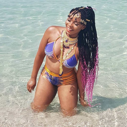 Hotness! Yemi Alade Shares Cute Bikini Photos On A Beach In Dubai, She Looks Banging!! [Photos]
