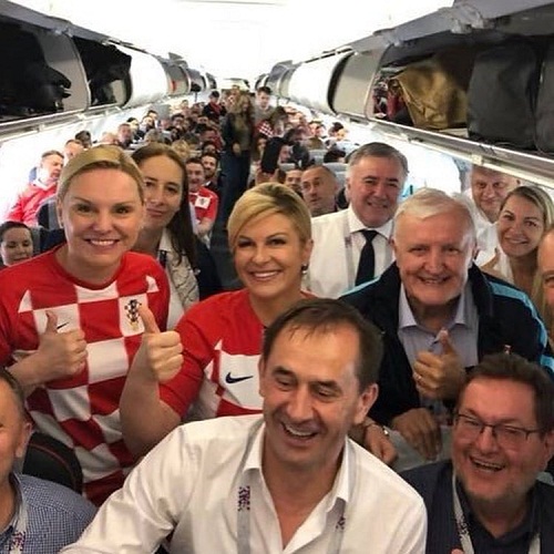 See Photos Of Croatian Female President At The World Cup, That Is Making Football Fans Drool On Bench!