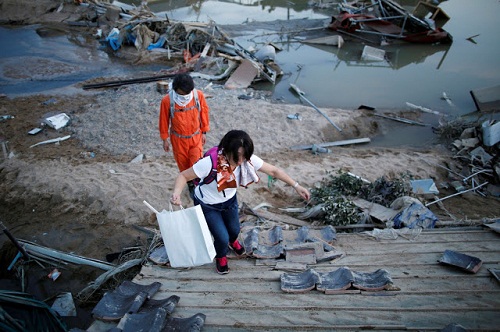 Heart melting Photos from The Devastated Flood That Happened in Japan [Photos]