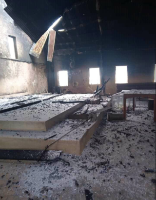 Heartbroken Residents Worship in Their Burnt Church after Plateau Massacre [Photos]