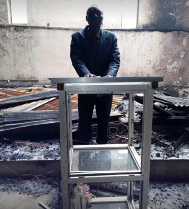 Heartbroken Residents Worship in Their Burnt Church after Plateau Massacre [Photos]