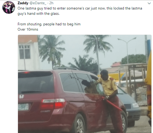 LASTMA Officer Begs In Pain After His Hand Gets Trapped In A Car When He Tried To Forcefully Enter A Car
