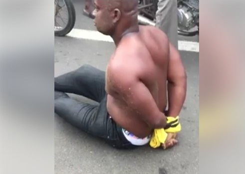 Yahoo plus!!! Nigerian Man ‘Runs Mad’ In Togo Beach, Confesses To Money Rituals [Photos/Video]