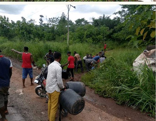Gullible Residents Rushed With Gallons To Scoop Fuel From Fuel Tanker That Had An Accident [Photos]