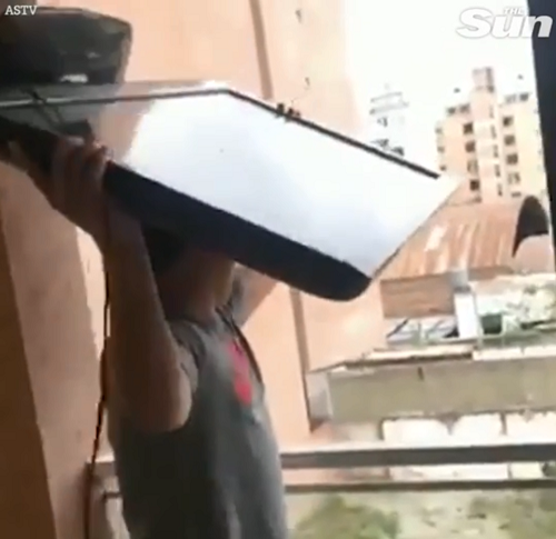 Angry Argentina Fan Throws His TV From Building After France Loss [Photos]