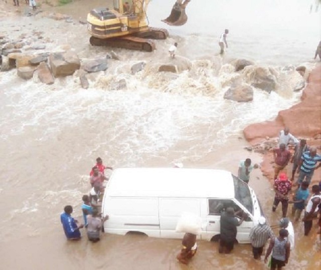 Motorists and Residents Cries Endlessly As N470million Niger Bridge Collapses [Photos]