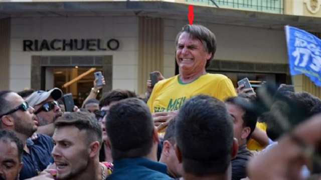 Brazil presidential candidate fighting for his life after he was stabbed by an attacker [photos]