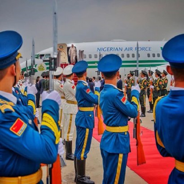 Photos Of President Buhari As He Arrives Beijing, China