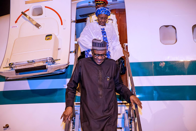 More Photos of President Buhari and His Wife Aisha As They Arrives Nigeria