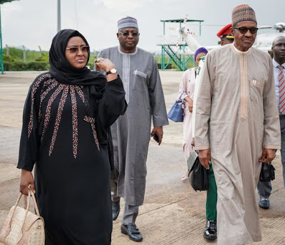 More Photos of President Buhari and His Wife As They Departs To China