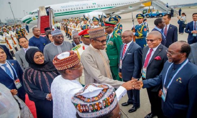 Photos Of President Buhari As He Arrives Beijing, China