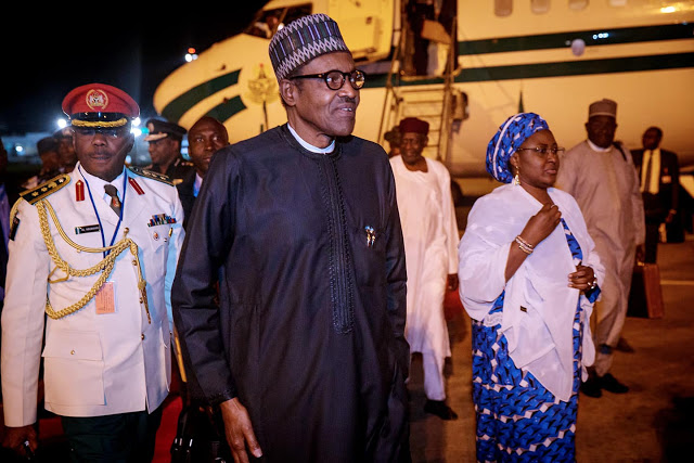 More Photos of President Buhari and His Wife Aisha As They Arrives Nigeria