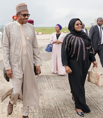 More Photos of President Buhari and His Wife As They Departs To China