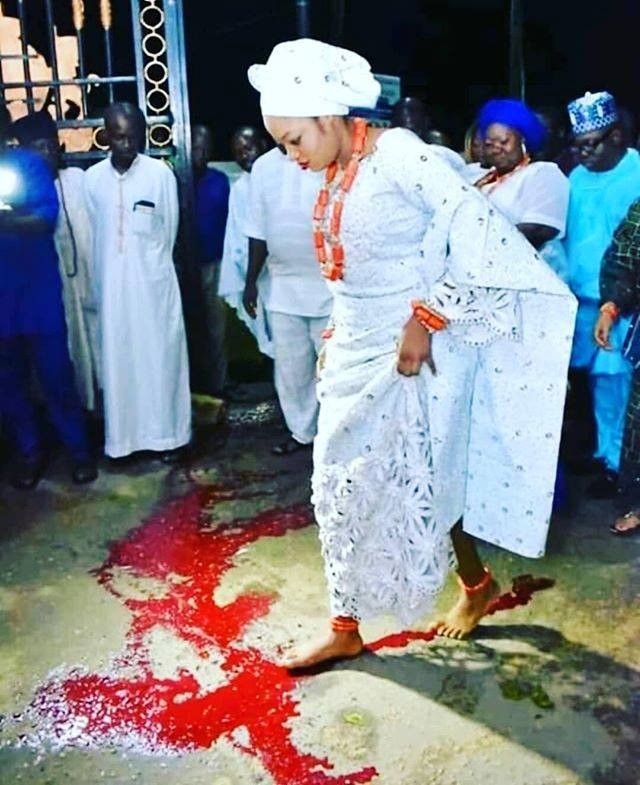 New Photo Of Ooni Of Ife's Wife, Prophetess Naomi, Crossing A Spill Of B L O O D While Performing Her Marriage Rites Floods The Internet