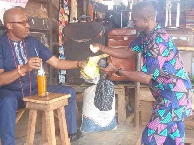 2019 Election: Hon Patrick Obahiangbon Spotted Eating a Loaf of Bread [Photos]