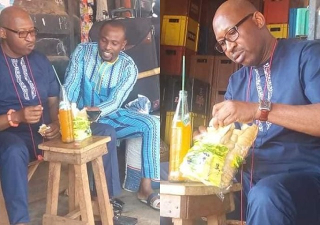 2019 Election: Hon Patrick Obahiangbon Spotted Eating a Loaf of Bread [Photos]