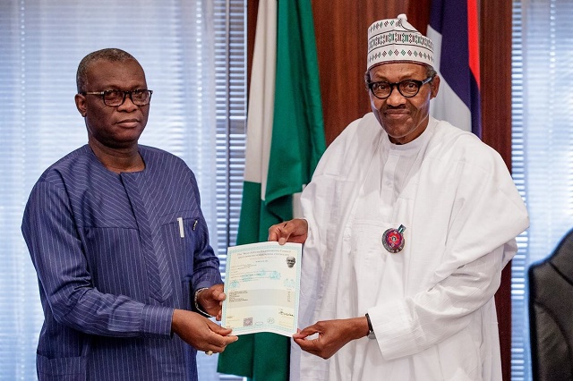 More Photos of President Buhari As He Receives His WAEC Certificate