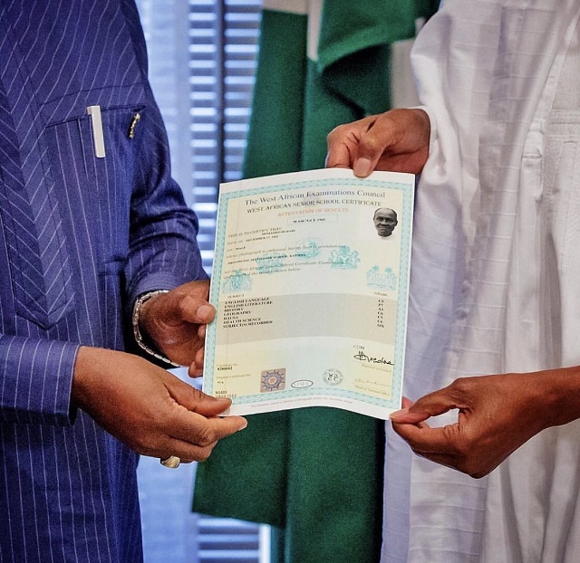 More Photos of President Buhari As He Receives His WAEC Certificate