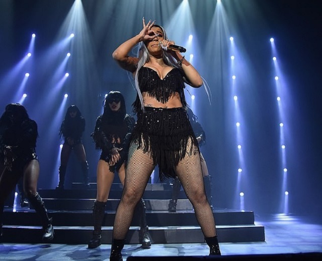 Cardi B Flashes Massive Backside in Fringed Bralet and Skirt As She Performs In New York City [Photos]