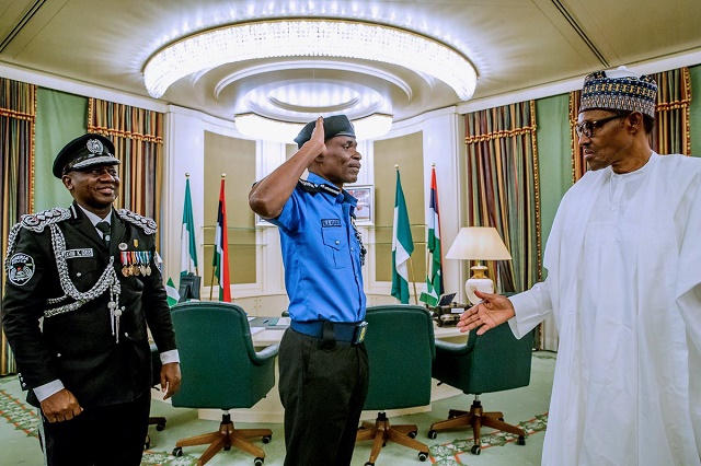 More Photos of President Buhari As He Decorates Mohammed Adamu as the New Acting Inspector General of Police
