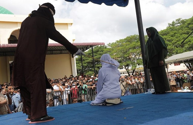 Teenagers Flogged Publicly For Hugging Each Other In Indonesia [Photos]