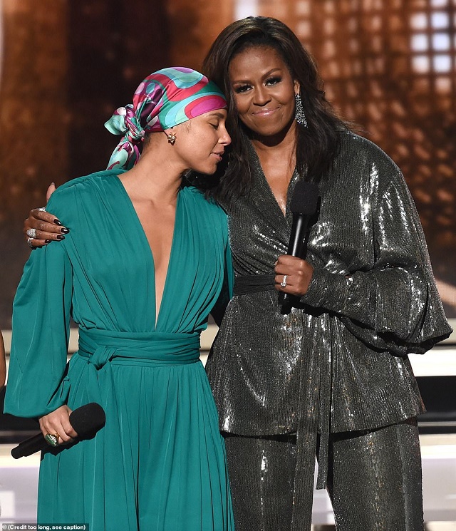 Photos Of Michelle Obama As She Makes A Surprise Appearance At The Grammys, Joining Alicia Keys, Jennifer Lopez, Jada Pinkett, And Lady Gaga On Stage