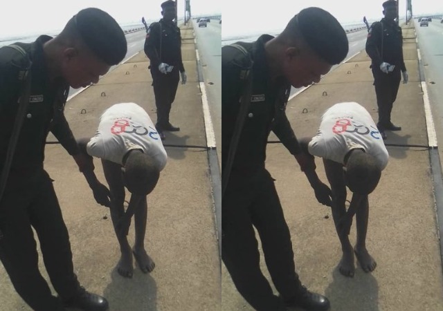 Shocking!! Police Saves Man Attempting To commit Suicide [Photos]