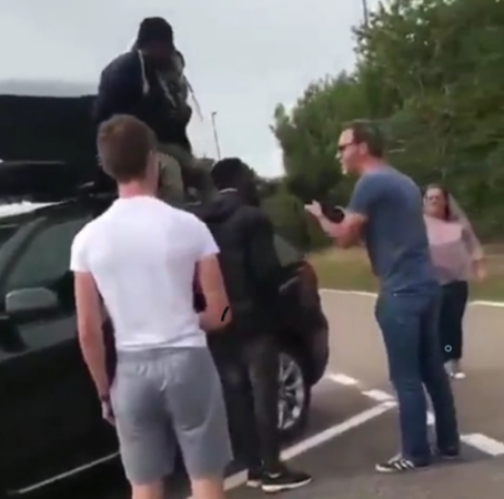 A British Family Arrives Back In The UK From Holiday, Discovers Two Africans Hiding In Their Car Roof Rack (Video)