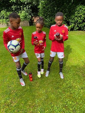 Odion Ighalo's Children Stuns In New Manchester United Jerseys(Photos)