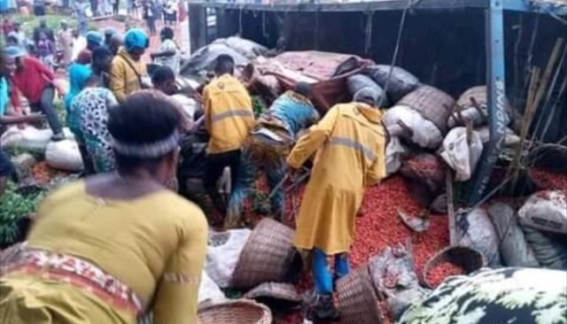 Truck Crashes, Leaving Traders Trapped Under Loads Of Farm Produce