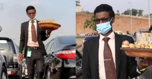 Meet Nigerian Man Who Wears Suit To Hawk