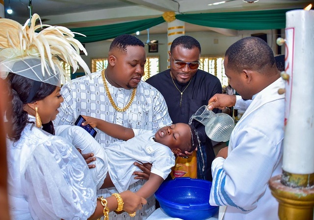 “My Son Pulled Up To the House Of God for Baptism on All White” – Cubana Chief Priest Says As Son Undergoes Water Baptism (PHOTOS)