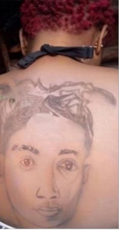 Shishi you no go see, Na Carpenter Draw Am? – Reactions As Die-Hard Fan Tattoos Bella Shmurda On Her Body