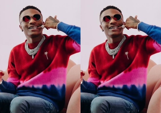 Moment Wizkid Prevented a Tall & Muscular Guy from ‘Bullying’ Him during an Argument – [VIDEO]