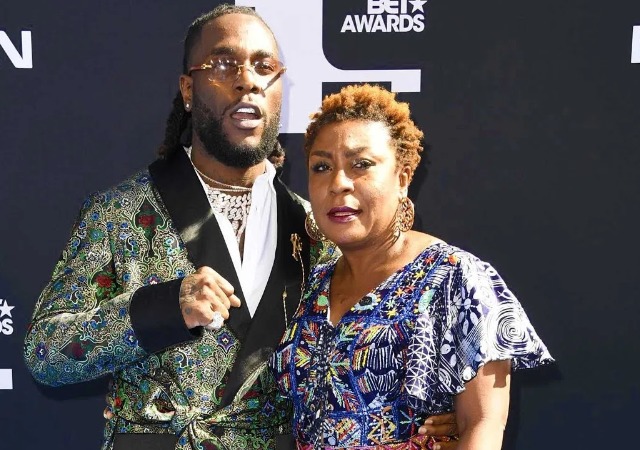 Lady Drags Burna Boy and His Mom, Bose Ogulu Through The Mud Over Unpaid “Bole and Fish” Delivery in London [DETAILS]