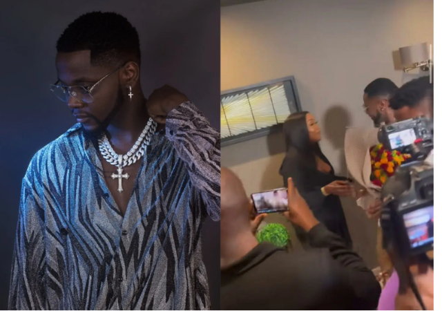 Kizz Daniel apologizes after snubbing lady who presented him with flowers in Zambia