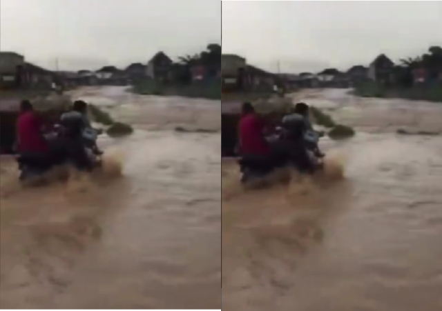 Bike Rider Who Refused To Let Go Of His Bike Swept Away By Flood [Video]