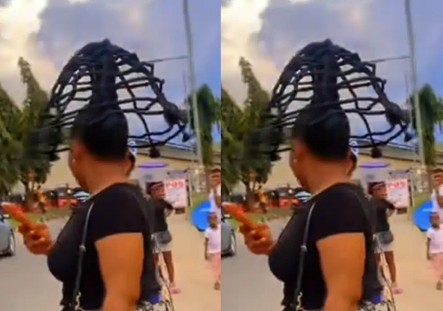 Nigerian lady raises eyebrows on online with her unique umbrella-like hairstyle