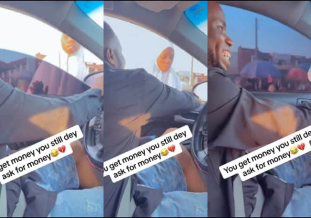 “How u wan take sleep” – Motorist sparks reactions as he snatches money from a beggar, zooms off