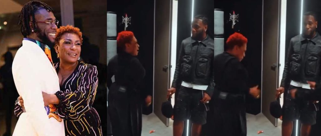 Burna Boy Blushes as Mom Hypes Him in New Video